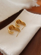 Ninelle 18K Gold Non-Tarnish Sculpted Wave Hoop Earrings